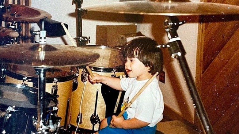 Young Wolfgang Van Halen playing drumgs