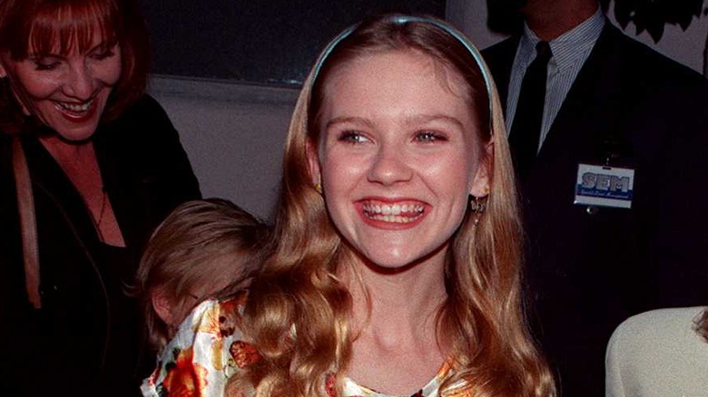 Kirsten Dunst smiling at the premiere of Jumanji