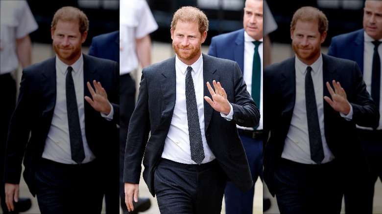 Prince Harry smiling and waving