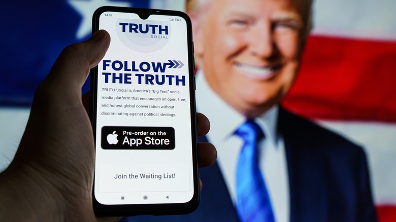 Phone with Truth Social app open 