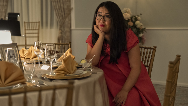 Jenny Han sitting at table