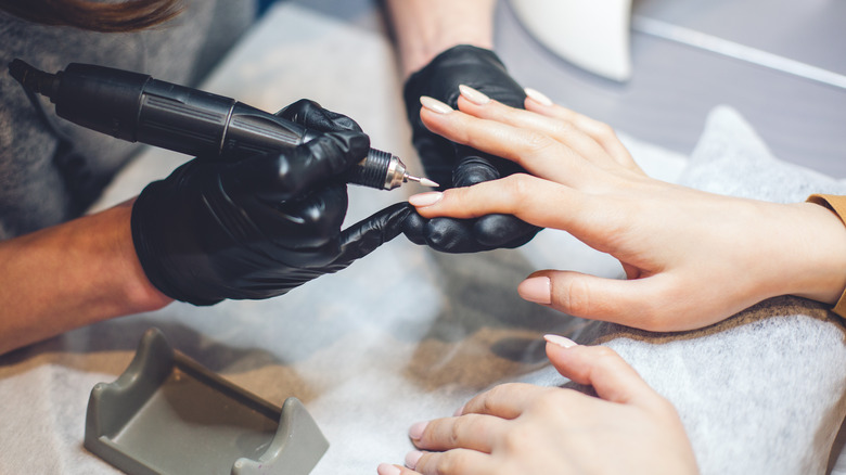 Woman getting a manicure