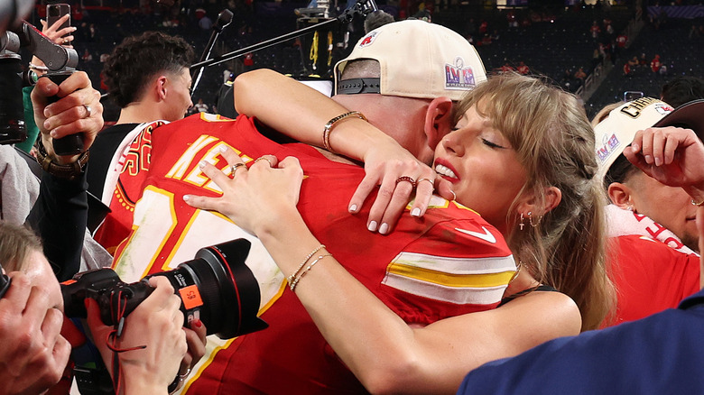 Taylor Swift embracing Travis Kelce at The Super Bowl