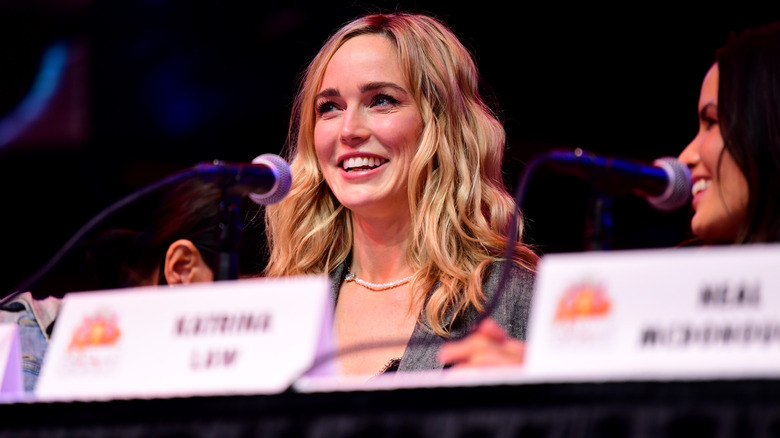 Caity Lotz speaking at a panel