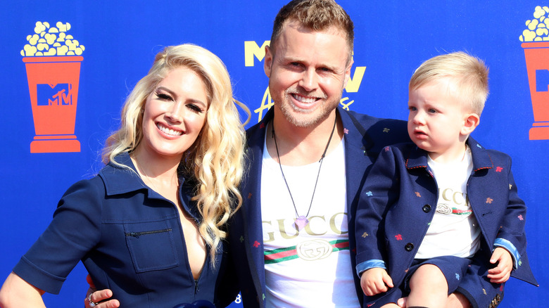 Heidi Montag, Spencer Pratt, and their son smiling 