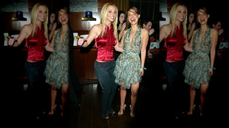 Britney Spears and Natalie Portman posing at a party they co-hosted