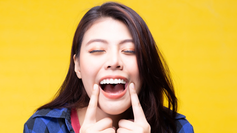 Woman showing off teeth and smile