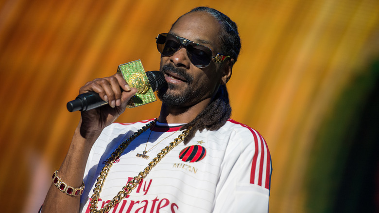 Snoop Dogg holding microphone