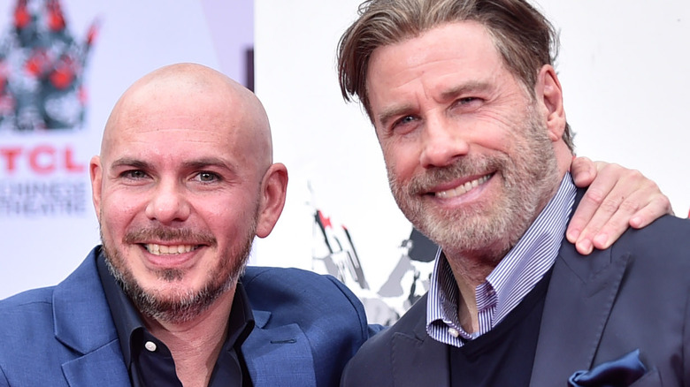 Pitbull and John Travolta