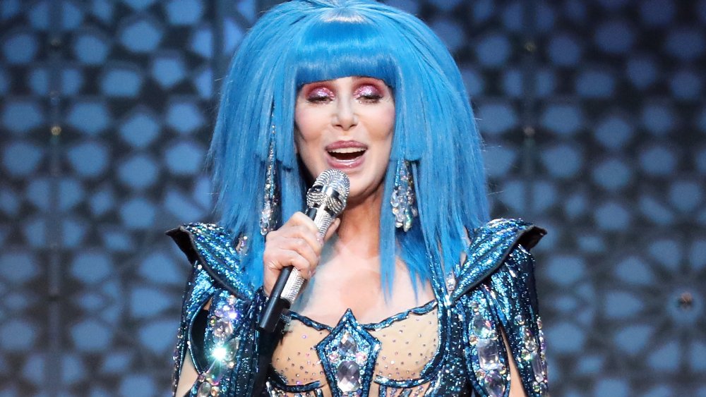 Cher performing