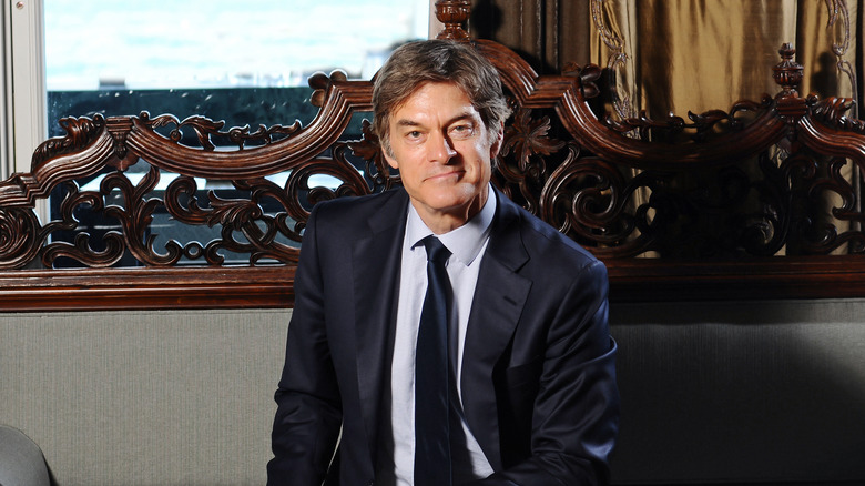Dr. Oz seated 