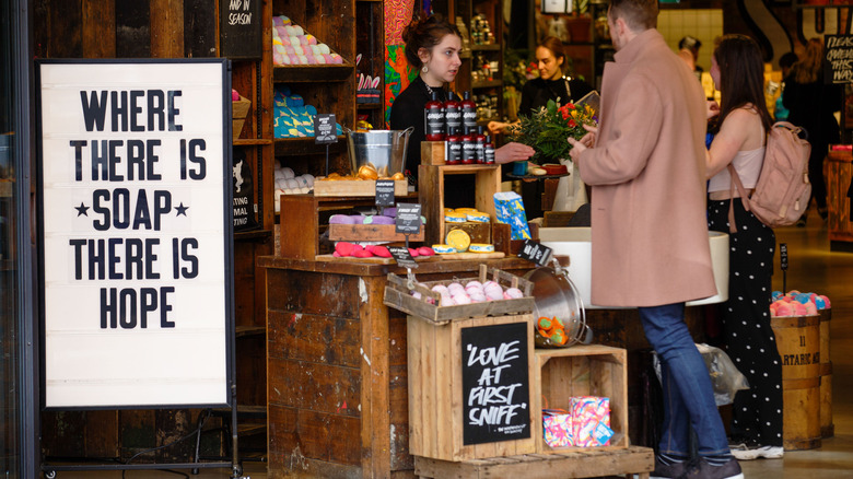 Lush cosmetics store with people shopping