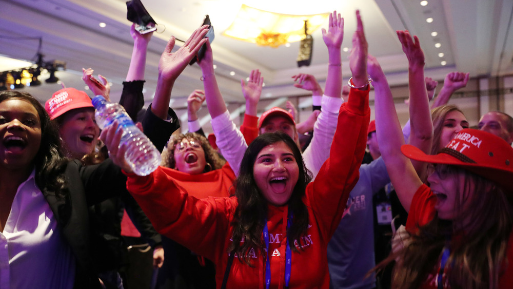 Attendees cheer at CPAC 2021