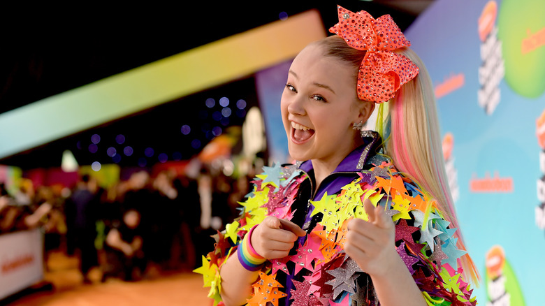 JoJo Siwa poses on the red carpet