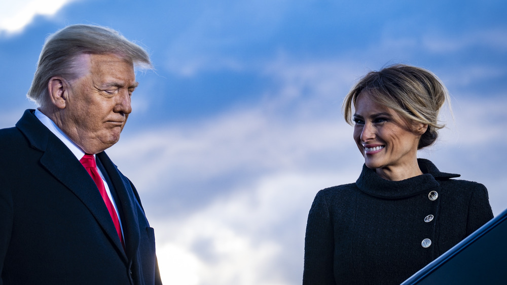 Melania Trump smiling at Donald