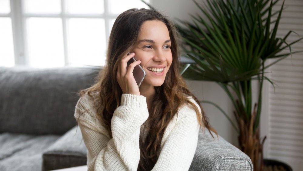 woman on phone with customer service