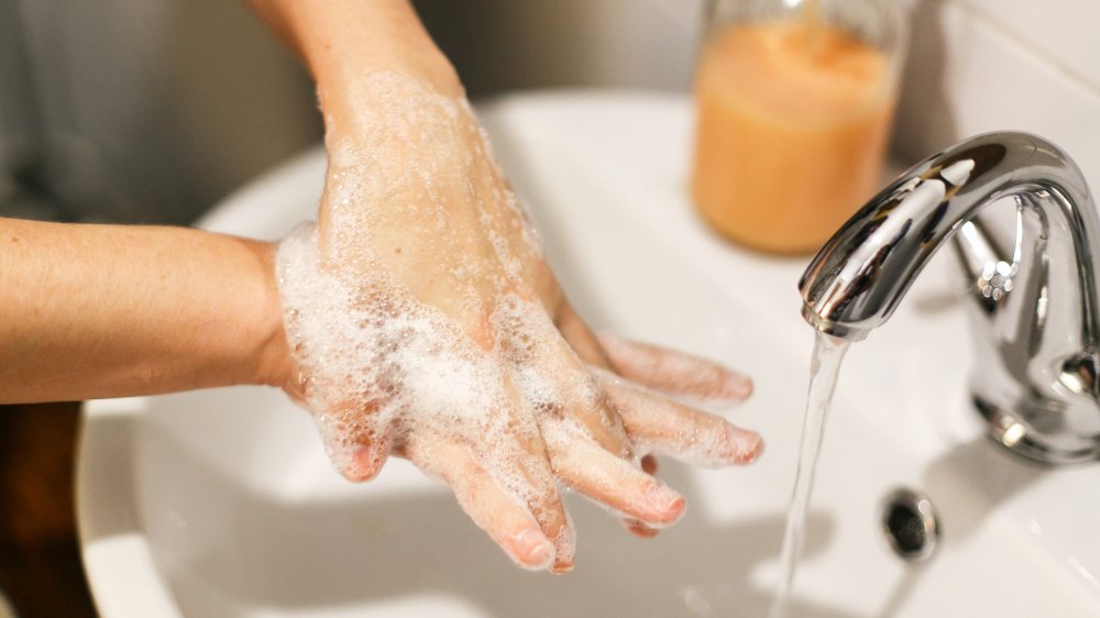 woman washing hands