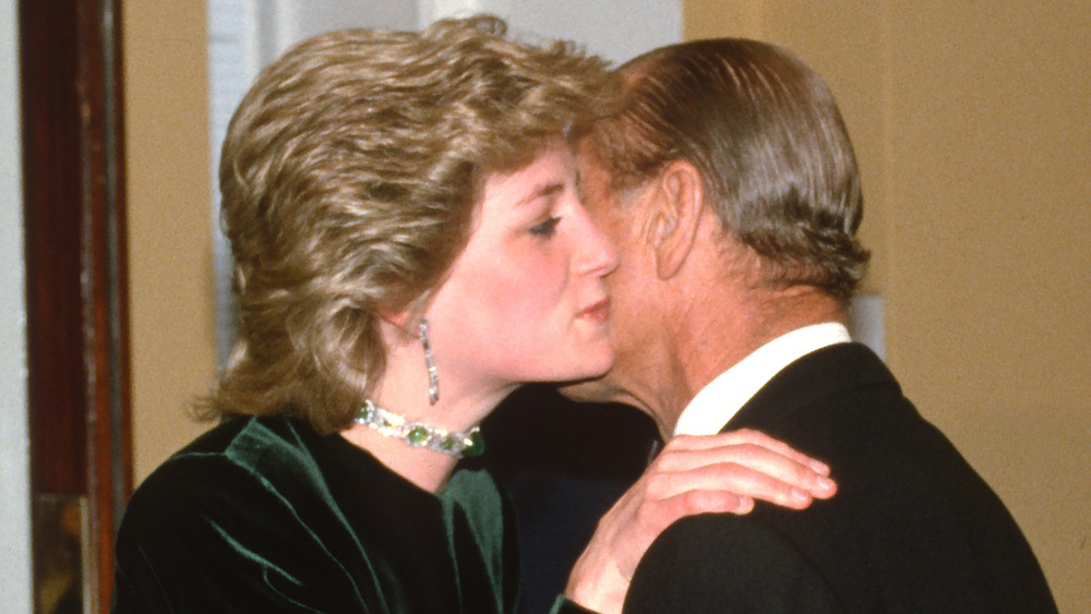 Prince Philip embracing Princess Diana