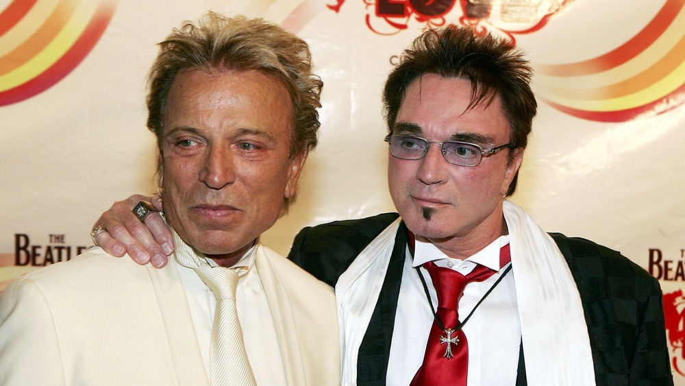 Siegfried and Roy posing