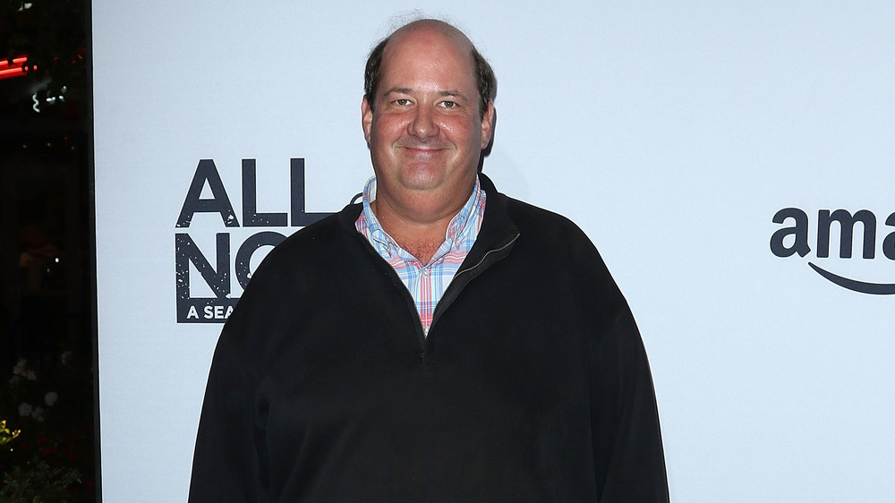 Brian Baumgartner with a small smile