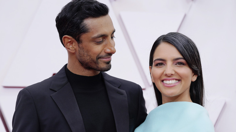 Riz Ahmed and wife Fatima pose