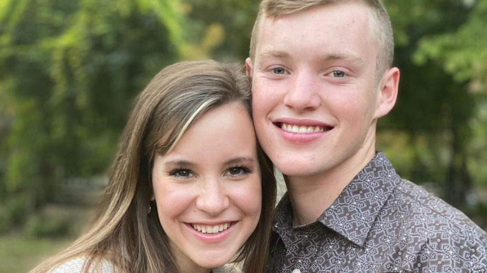 Justin Duggar and Claire Spivey pose for an engagement announcement