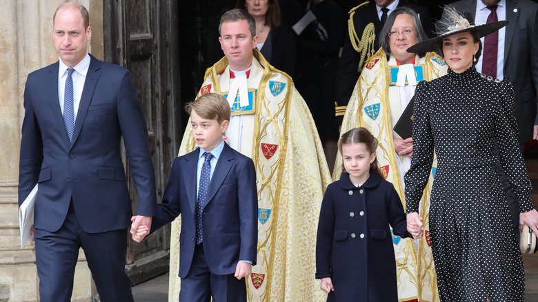 Prince William, Prince George, Princess Charlotte, and Kate Middleton leaving Prince Philip's memorial