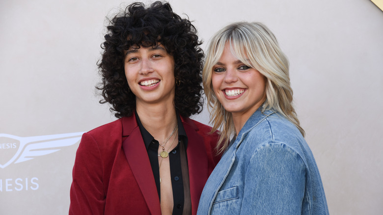 Renée Rapp and Towa Bird smiling for photos