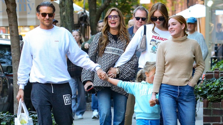 Bradley Cooper and Brooke Shields walking with daughters