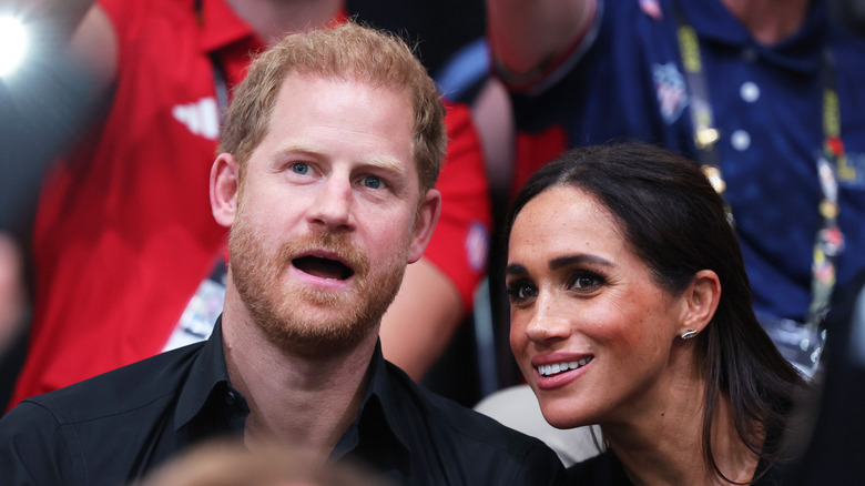 Prince Harry and Meghan Markle talking