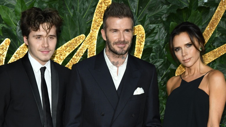 Brooklyn Beckham, David Beckham and Victoria Beckham