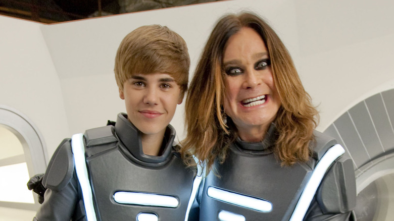 Ozzy Osbourne and Justin Bieber posing in costume