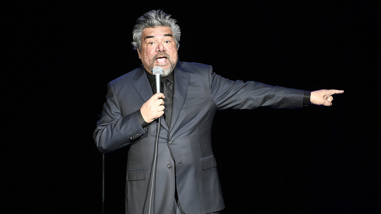 George Lopez performing on stage