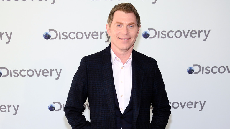 Chef Bobby Flay in a suit at the red carpet