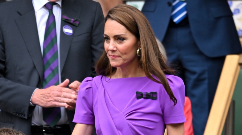 Kate Middleton straight-faced