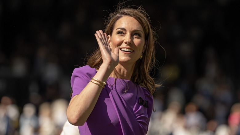 Kate Middleton smiling, waving