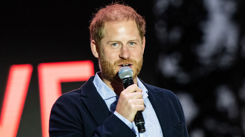 Prince Harry speaking on stage