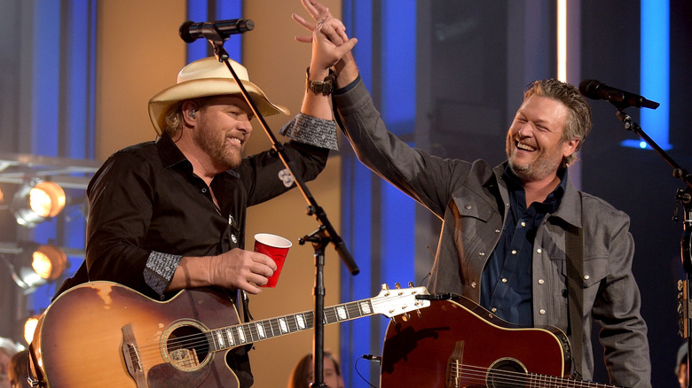 Toby Keith and Blake Shelton onstage