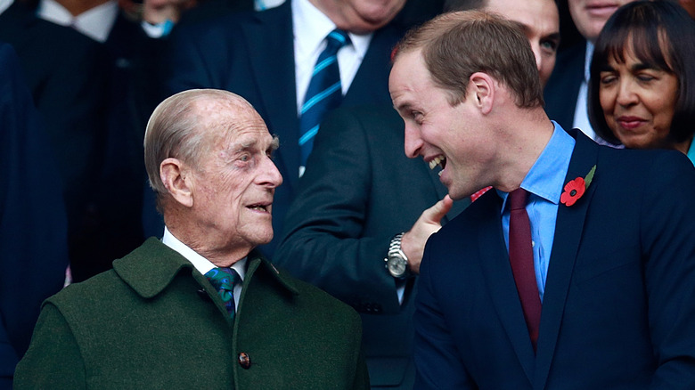 Prince William with grandfather Prince Philip.