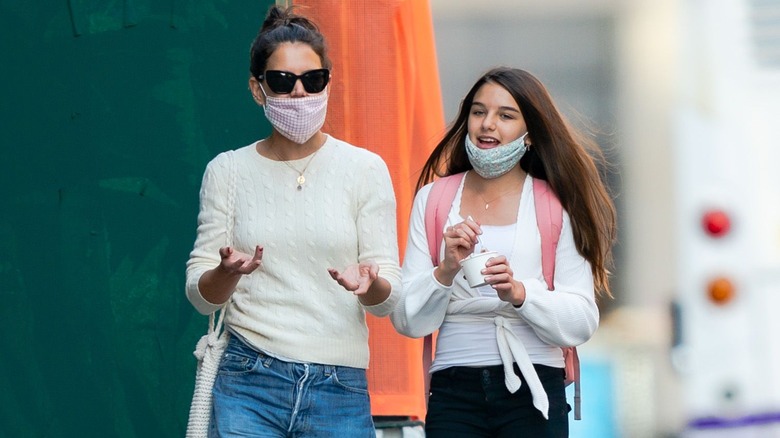 Katie Holmes and Suri Cruise talking in NYC