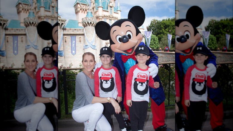 Celine Dion posing with twins