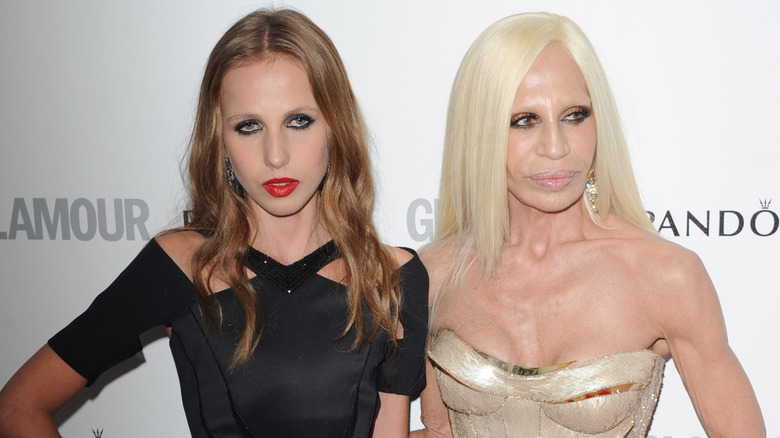 Allegra Beck Versace and Donatella Versace posing together