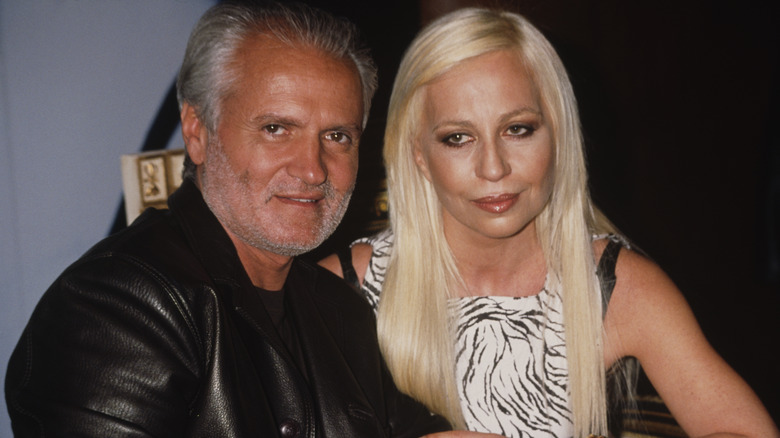 Gianni Versace and Donatella Versace sitting together