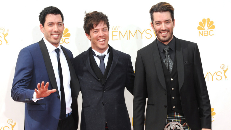 Drew Scott, J.D. Scott, and Jonathan Scott smiling