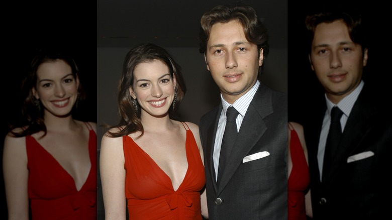 Anne Hathaway in red dress with Raffaello Follieri