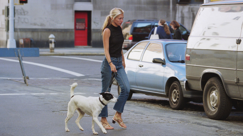 Carolyn Bessette Kennedy walking her dog