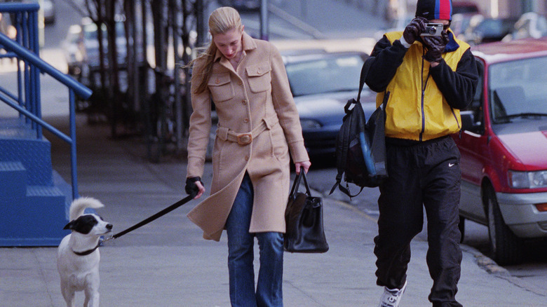 Carolyn Bessette Kennedy walking her dog