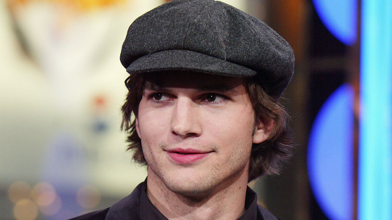 Ashton Kutcher smirking