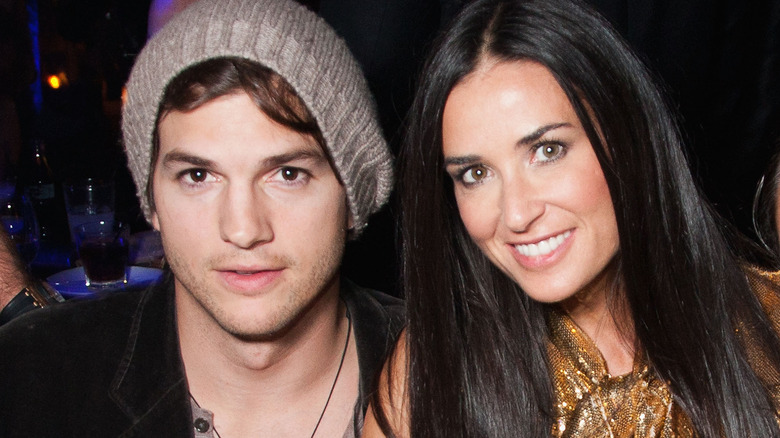 Ashton Kutcher and Demi Moore smiling