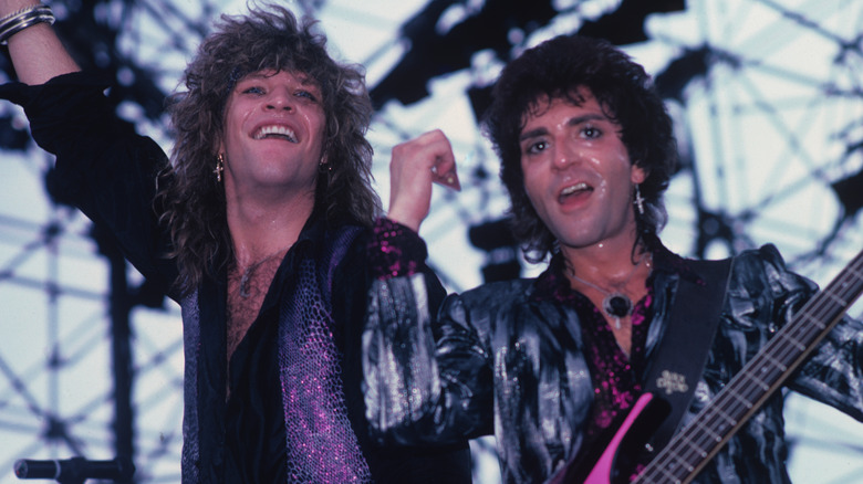 Jon Bon Jovi and Alec John Such performing